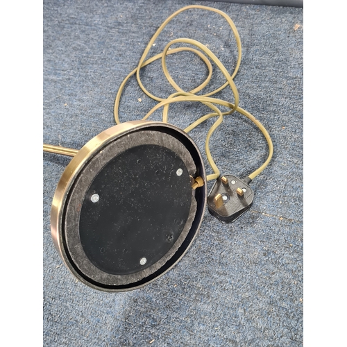 35 - A brass toned desk lamp with adjustable gooseneck light. Max reach 55cm.