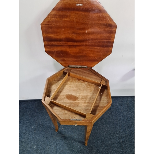 152 - Hexagonal topped musical Side Table with lockable sewing/ storage - key included. Has Sorrento ware ... 