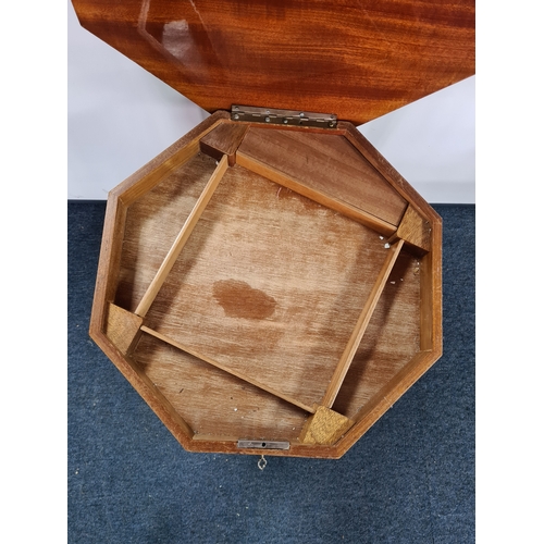 152 - Hexagonal topped musical Side Table with lockable sewing/ storage - key included. Has Sorrento ware ... 