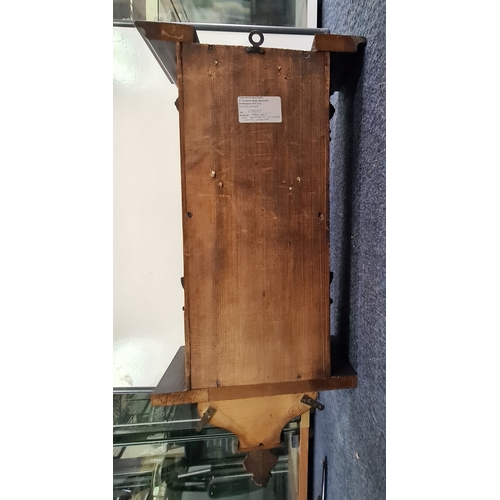 201 - A German /Austrian Antique Walnut Wall Clock. Measures 72cm high by 31.5cm wide by 18cm deep.