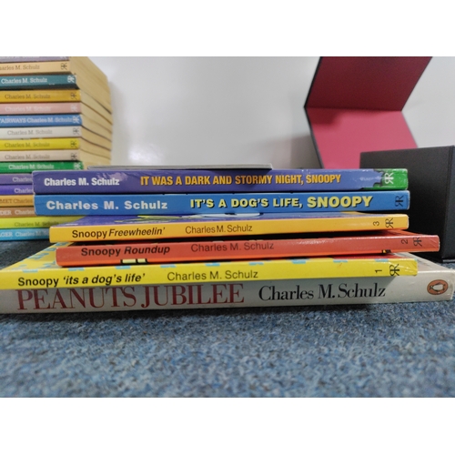 185 - A collection of approximately 24 snoopy comics. A collection of 5 car and motorbike magazine's with ... 