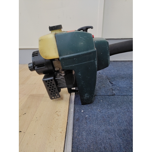 37 - A Qualcast petrol  strimmer From a house clearance thought to work