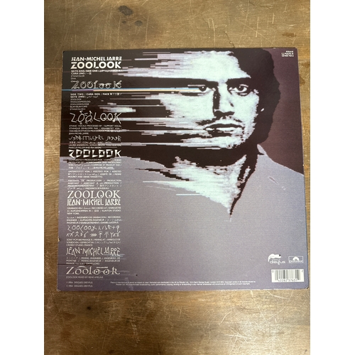 553 - Pair of Jean michel jarre vinyl records in mixed conditions