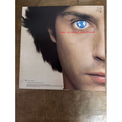 553 - Pair of Jean michel jarre vinyl records in mixed conditions