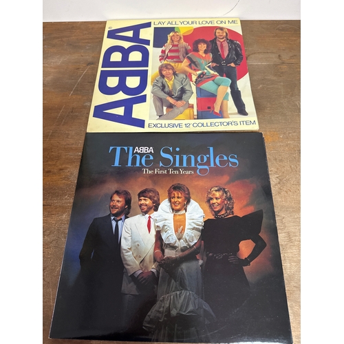 554 - Pair of Abba vinyl records in mixed conditions