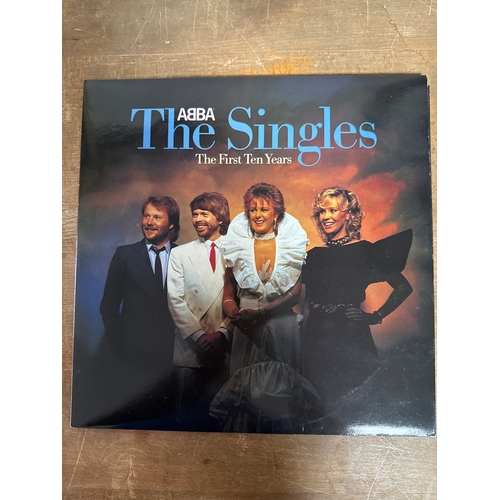 554 - Pair of Abba vinyl records in mixed conditions