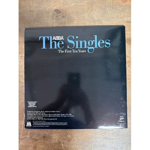 554 - Pair of Abba vinyl records in mixed conditions
