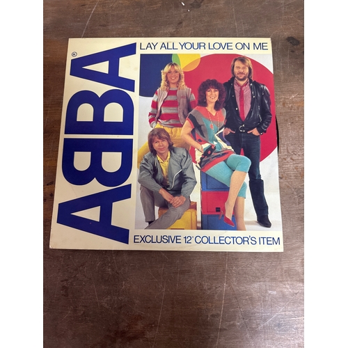 554 - Pair of Abba vinyl records in mixed conditions