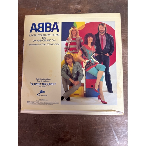 554 - Pair of Abba vinyl records in mixed conditions