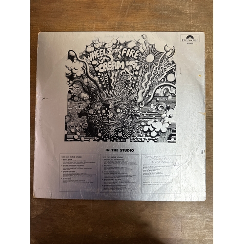 555 - Pair of cream  vinyl records in mixed conditions