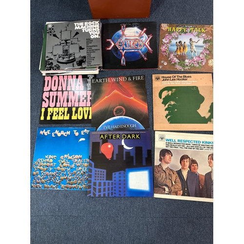 557 - Collection of vinyl records in various conditions and they come complete with a vinyl record case.