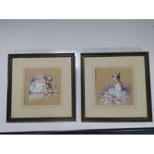 115 - A pair of pastel paintings, depicting young ballet dancers. Framed and glazed with an Indistinct sig... 