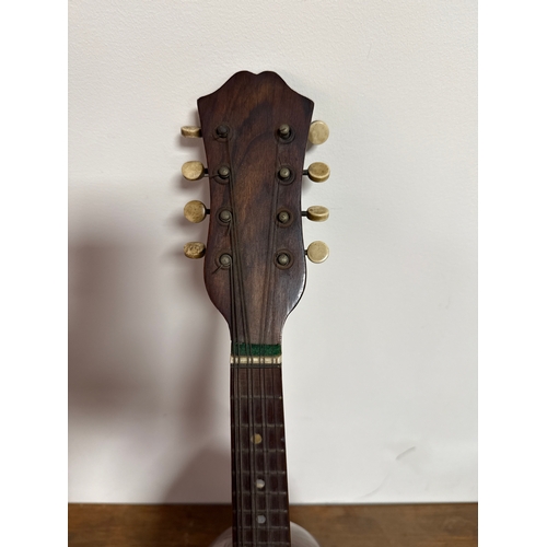 46 - Alfredo Albertini catania mandolin in reasonable condition.