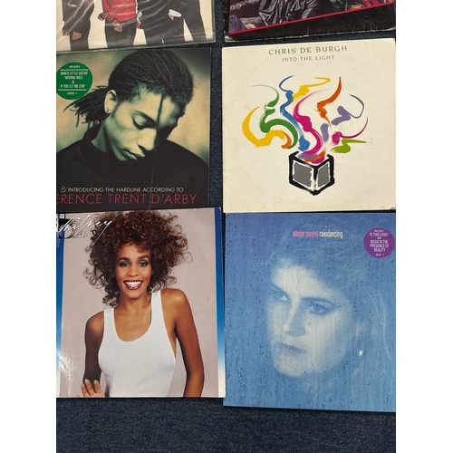 606 - Collection of vinyl records in various conditions