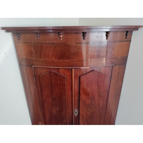 170 - An antique Victorian corner cabinet with Inlayed doors. Comes with original key. H 107cm x W 91cm x ... 