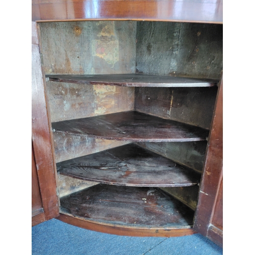 170 - An antique Victorian corner cabinet with Inlayed doors. Comes with original key. H 107cm x W 91cm x ... 