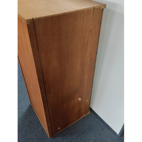 171 - A mid century teak shelved cabinet. H 89cm x W 40cm x D 40cm.
