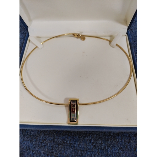 317 - A boxed 'Frey Wille' gold tone chain and pendant with enamelled Egyptian hieroglyphs.