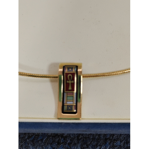317 - A boxed 'Frey Wille' gold tone chain and pendant with enamelled Egyptian hieroglyphs.