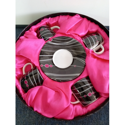 60 - A Llewelyn-Bowen for Royal Worcester coffee set, 4 espresso cups and saucers.