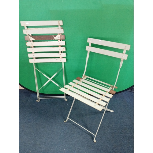 62 - Folding set of metal garden chairs and table