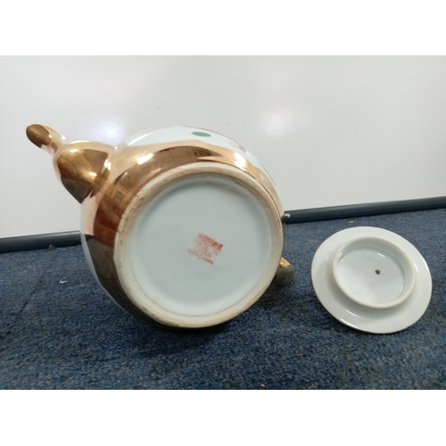 63 - A ceramic chinese tea set