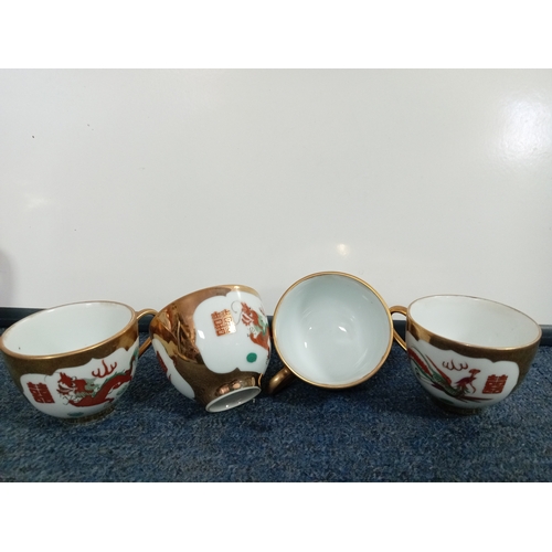 63 - A ceramic chinese tea set