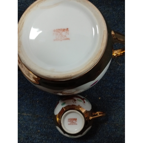 63 - A ceramic chinese tea set