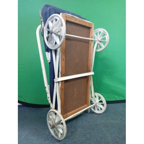 65 - A vintage navy blue collapsible dolls pram