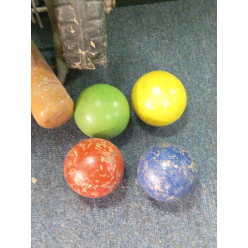 219 - A vintage croquet set. Complete.