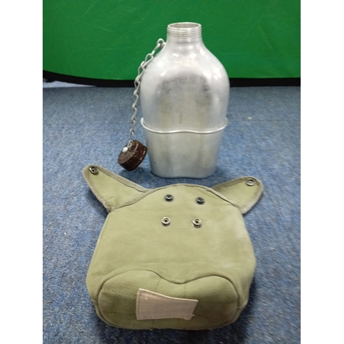 220 - A vintage military canteen complete with cover