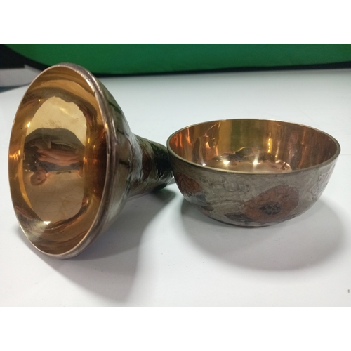 221 - A cloisonne pear shaped container with design depicting flowers and leaves paired with an incence bu... 