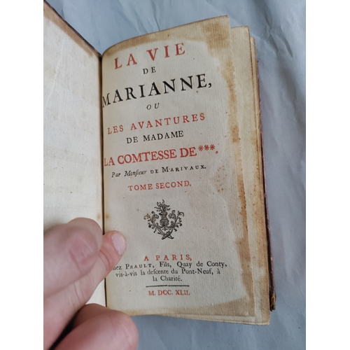 83 - A collection of 18th century leather bound books. To include; La vie De Marianne ou Les avantures De... 
