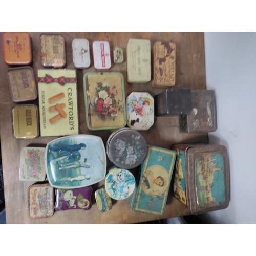 90 - A collection of antique and vintage tins