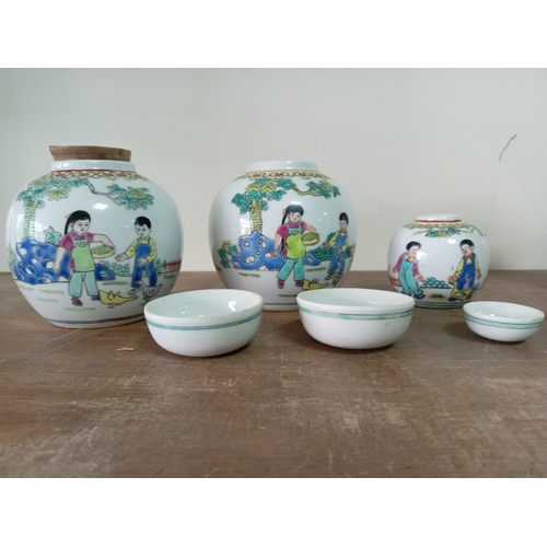94 - A set of 3 Chinese ginger jars depicting children playing.
