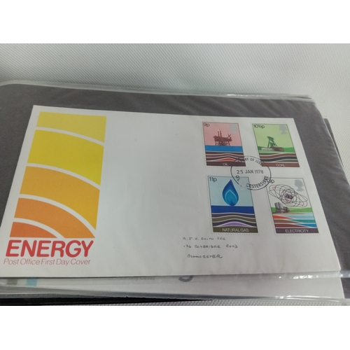 265 - An album with APX 50 first day covers mostly from 70s-80s. Last few pages are royal mail mint stamps... 