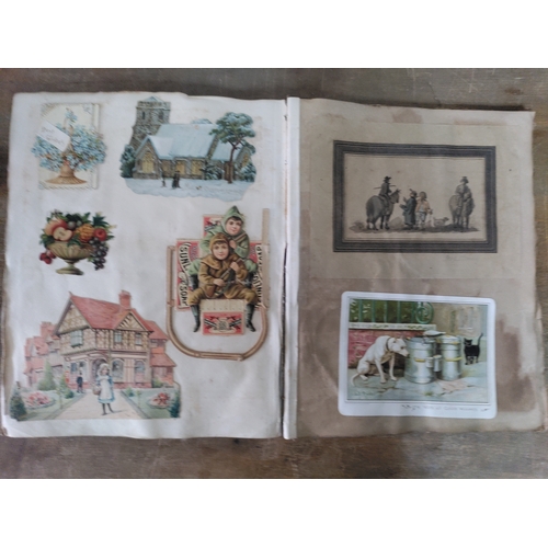 267 - A Victorian to Edwardian album of postcards, greetings cards and photographs.