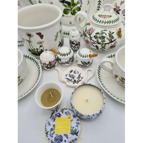 223 - A collection of 18 pieces of PortMeirion 'The Botanic Garden' crockery to include: a clock; 2 large ... 