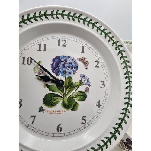 223 - A collection of 18 pieces of PortMeirion 'The Botanic Garden' crockery to include: a clock; 2 large ... 