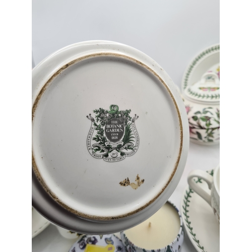 223 - A collection of 18 pieces of PortMeirion 'The Botanic Garden' crockery to include: a clock; 2 large ... 