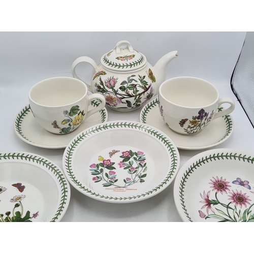 223 - A collection of 18 pieces of PortMeirion 'The Botanic Garden' crockery to include: a clock; 2 large ... 