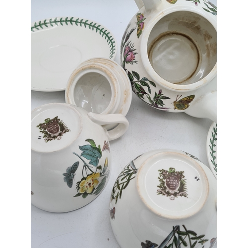 223 - A collection of 18 pieces of PortMeirion 'The Botanic Garden' crockery to include: a clock; 2 large ... 