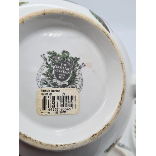 223 - A collection of 18 pieces of PortMeirion 'The Botanic Garden' crockery to include: a clock; 2 large ... 