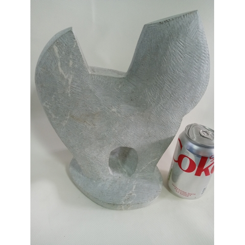 229 - A stone hand carved abstract artwork