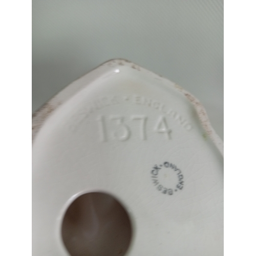 231 - A beswick galloping brown horse. Model no 1374. Small repairs made between hooves and base. Displays... 