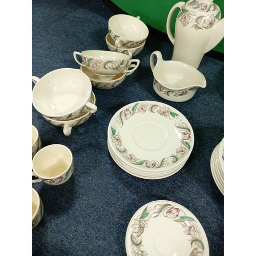 232 - A collection of Susie Cooper 'Endon'. To include serving plates, casserole dishes, side plates, dinn... 