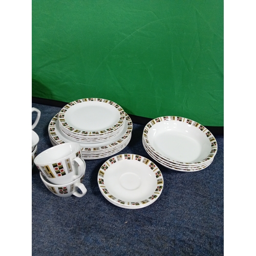 234 - An Alfred Meakin dinner/tea set to include bowls, side plates, dinner plates, cups, saucers, milk ju... 