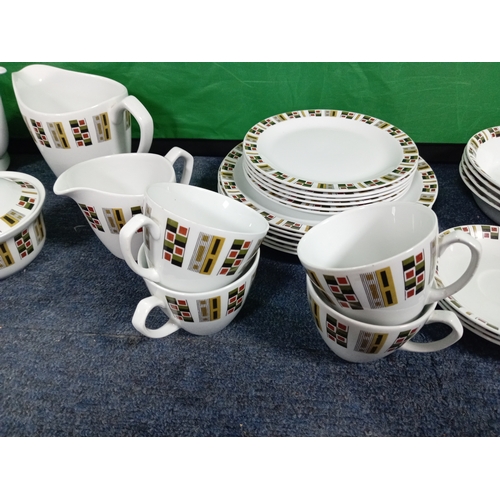 234 - An Alfred Meakin dinner/tea set to include bowls, side plates, dinner plates, cups, saucers, milk ju... 