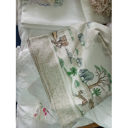 242 - A job lot of vintage embroided linen.