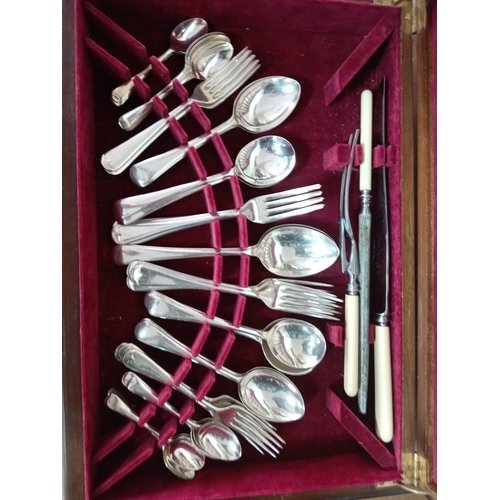 245 - A six service silver plated canteen of cutlery set by Priestly and Moore in an art deco wooden box.